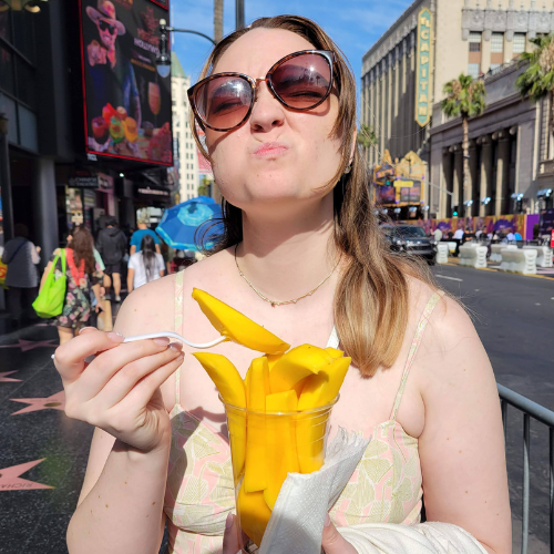 Eating fresh mango on the Hollywood walk of fame.