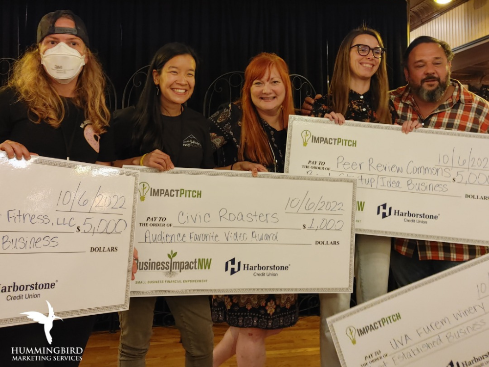 Andi Lucas of Hummingbird Marketing Services Celebrating the winners of Impact Pitch in 2022