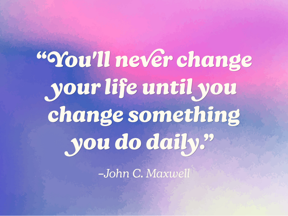 This inspiring quote: “You'll never change your life until you change something you do daily" by John C. Maxwell, against a pink and purple watercolor gradient background. From the blog, How to Avoid Burnout, Writer’s Block, and Creative Slumps by Hummingbird Marketing Services.